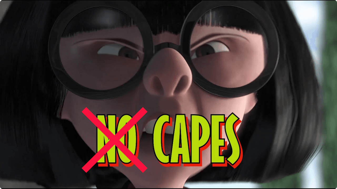 Edna from The Incredibles saying "No Capes" but with "No" crossed out. Edna from The Incredibles saying "No Capes" but with "No" crossed out.